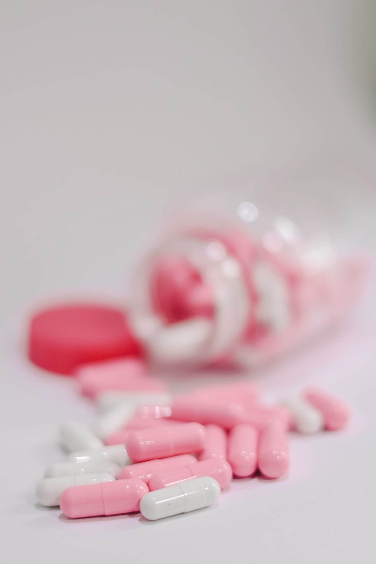 Pills spilling from a prescription bottle
